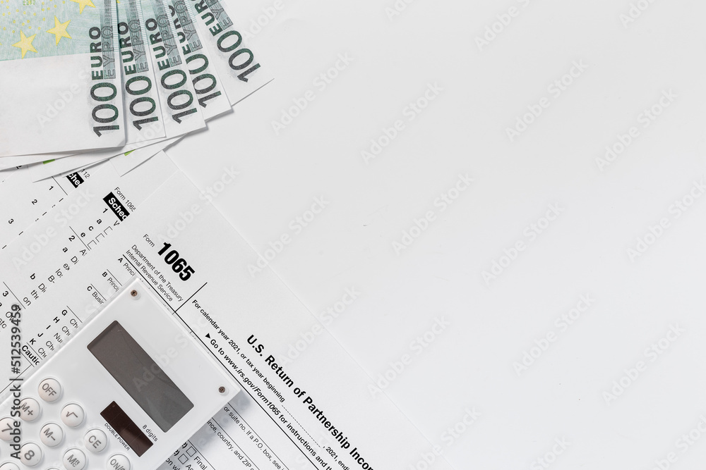 Obraz premium Annual tax form under US law with money cash. Tax payment season