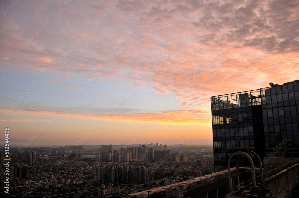  building with clouds