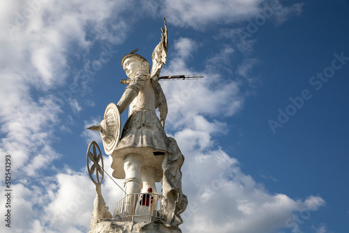 Statue of Archangel Saint Michael overlooking Ibarra, ecuador photo