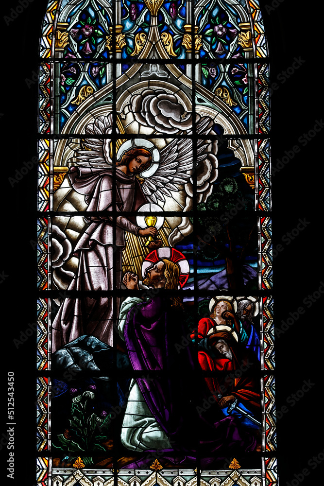 Basilica of the National Vow (Spanish: Basílica del Voto Nacional),  Quito, Ecuador. Stained glass depicting Jesus with an angel in the garden of olives