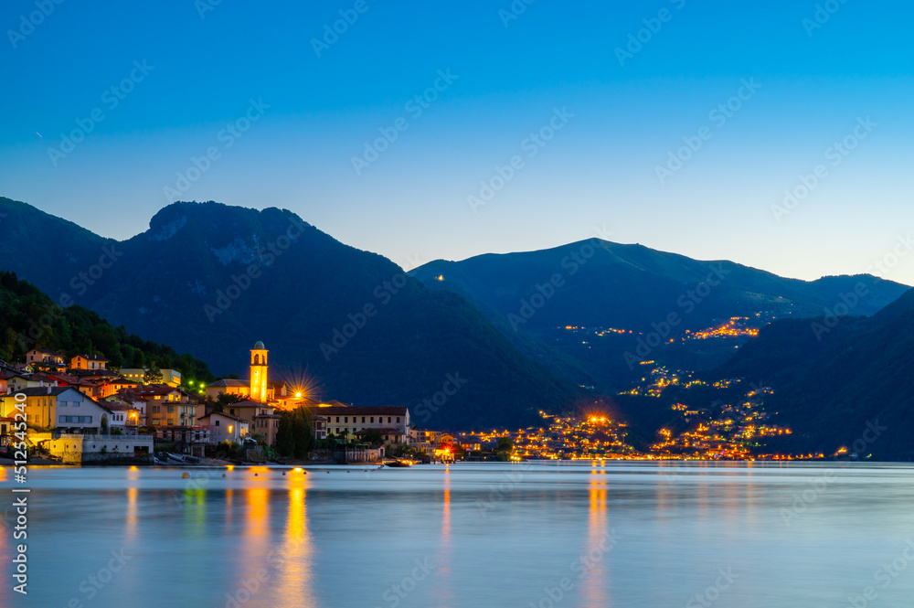 The village of Lezzeno and the panorama of Lake Como, photographed in the evening.

