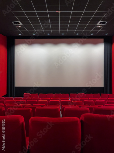 Cinema Screen And Red Seats. Empty Screening Theater