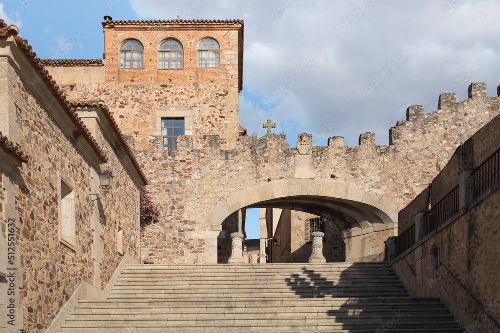 Panoramic view of the Arch of the Star of Cáceres from the main square, entrance to medieval Cáceres. It is part of a monumental architectural complex formed by the wall and the tower of Bujaco