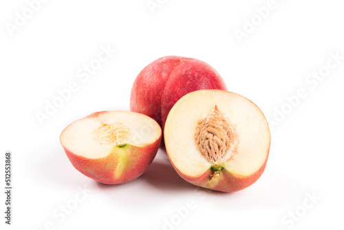 Peach with slice isolated on white background. 