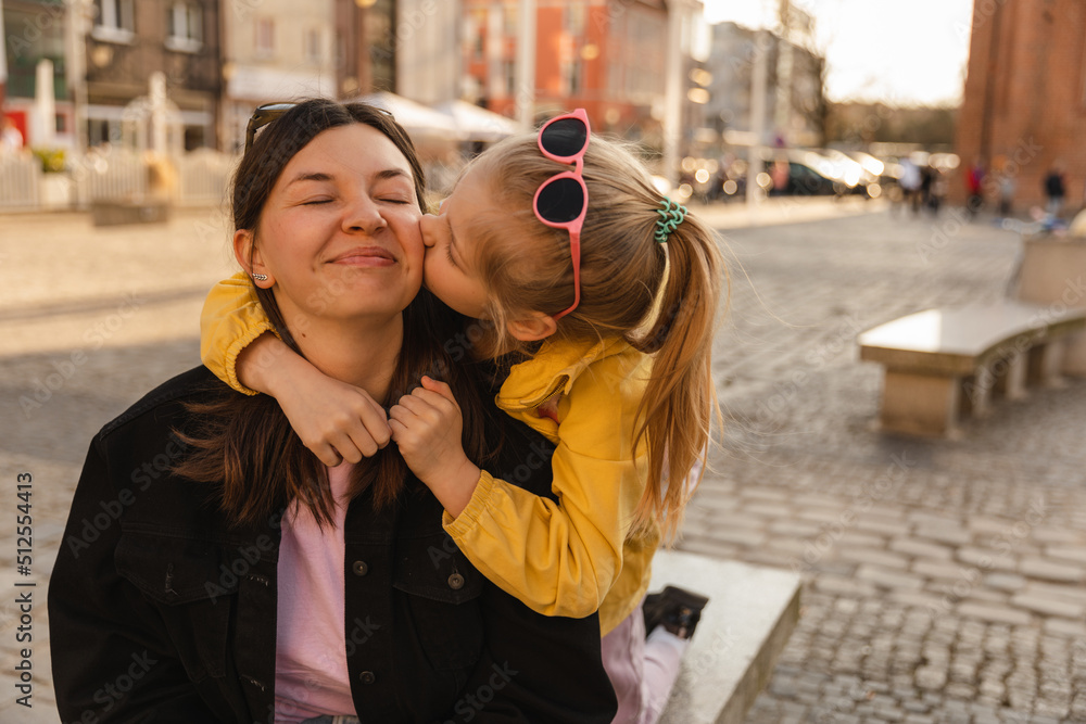 Fototapeta premium Close up view of cute mom and her young daughter 