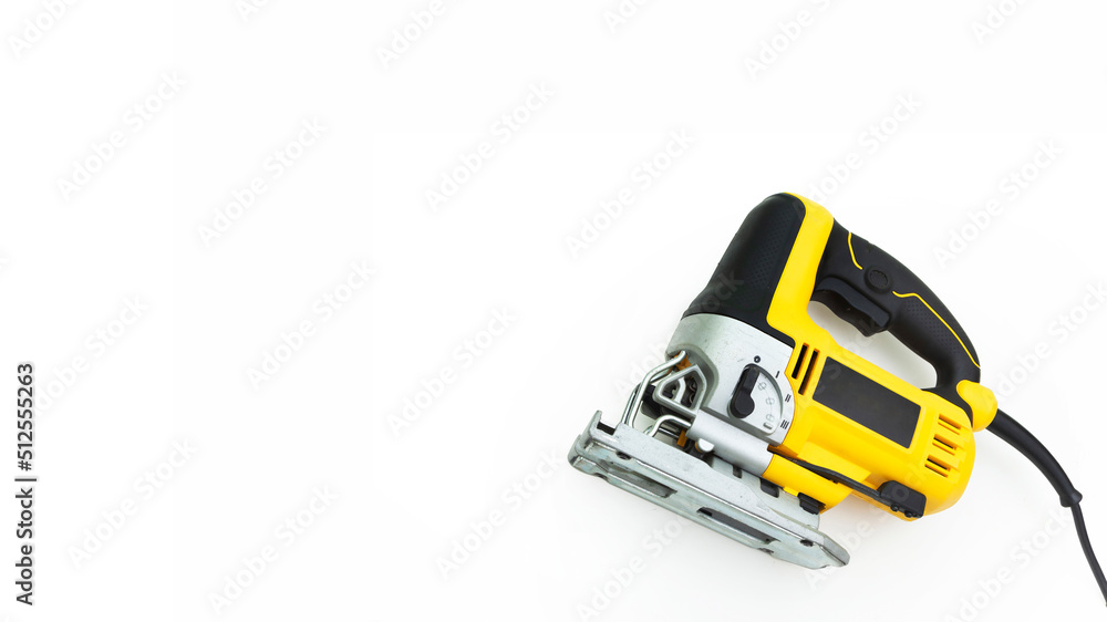 Naklejka premium yellow jigsaw without blade isolated white background