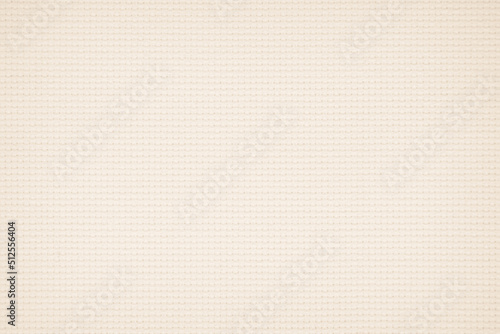 Fabric canvas woven texture background in pattern in light beige cream brown color gauze linen blank.