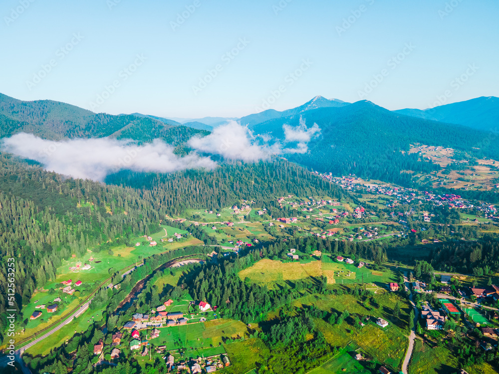 aerial view of carpathian mountains range white clouds