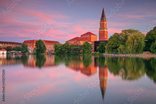 Obraz na płótnie Kiel, Germany. Cityscape image of downtown Kiel, Germany with Town Hall, Opera House and reflection of the skyline in Small Kiel at sunset. w salonie