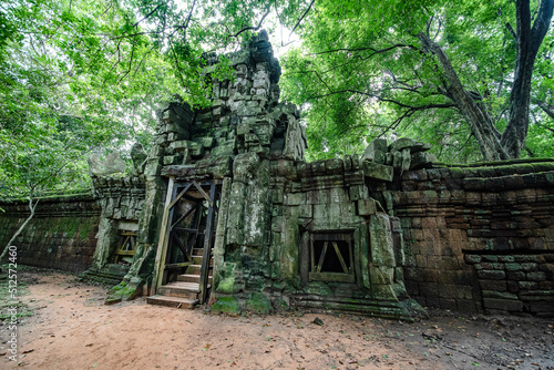 Walls and arches at the entrance to Ta Prohm Temple at Angkor Wat Siem Reap Cambodia