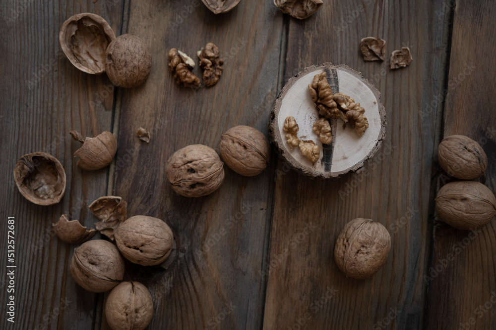 walnuts on wooden background walnuts on wooden background