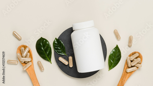 Canvas Print Top view mockup bottle of herbal vitamins or pills with green leaves, bio supple