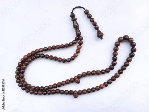 prayer beads or rosaries isolated on a white background