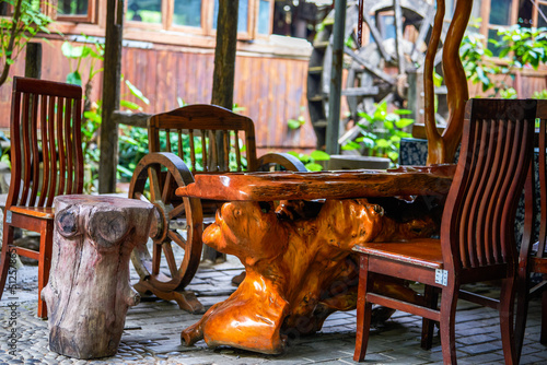 A set of traditional Chinese mahogany tables and chairs