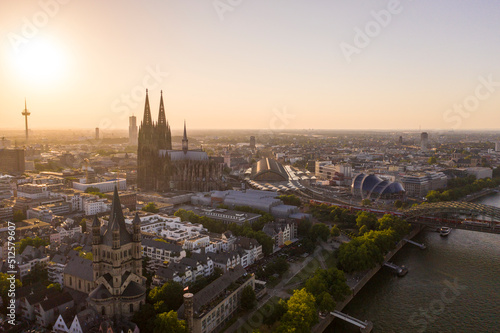 View of Cologne, city center, the Rhine river and Cologne Cathedral by sunset