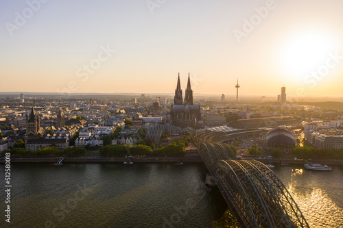 View of Cologne, the Rhine river and Cathedral by sunset