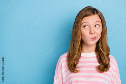 Photo of think teenager girl look promo wear white shirt isolated on blue color background