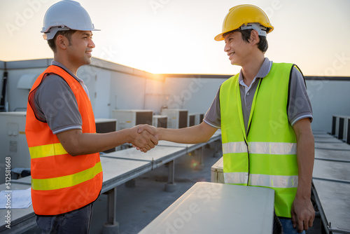 Construction worker team hands shaking greeting start up plan new project contract in office center at construction site, partnership and contractor concept..