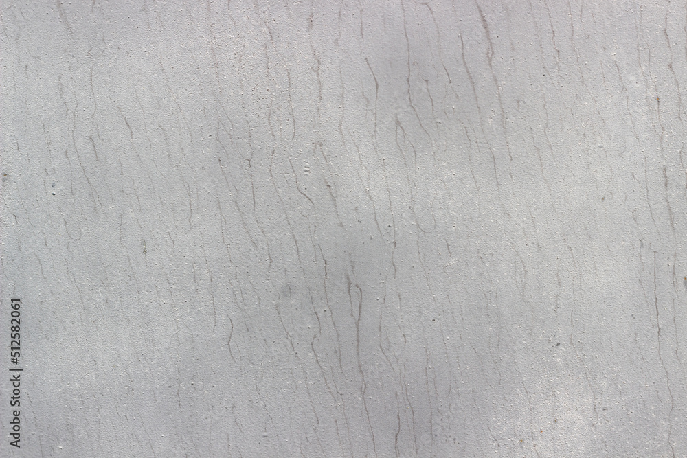 Fototapeta premium painted white sheet of metal, textured light background