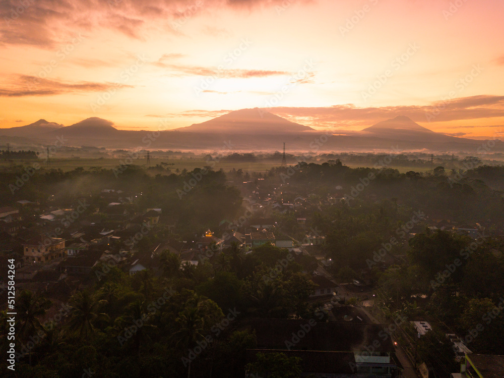 Drone photo of Sunrise sky with mountains on the countryside
