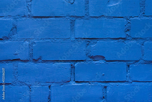 Blue paint brick wall of interior facade texture background architecture