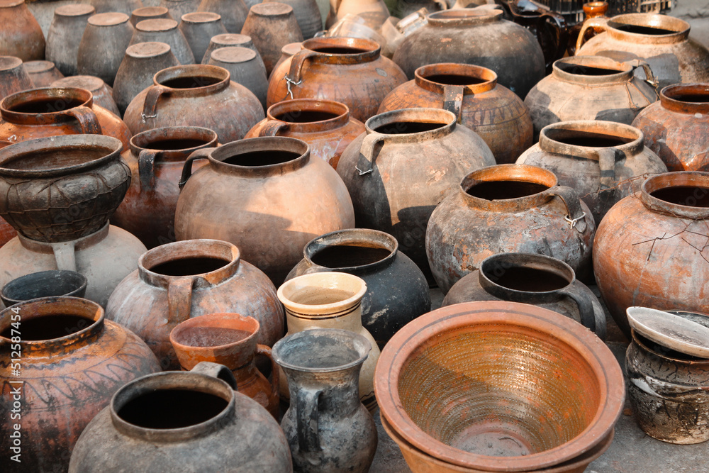 Old traditional clay pots. Old traditional pottery. Ancient clay pots of Ukrainian culture. Old traditional clay pots. Old traditional pottery. Ancient clay pots of Ukrainian culture.
