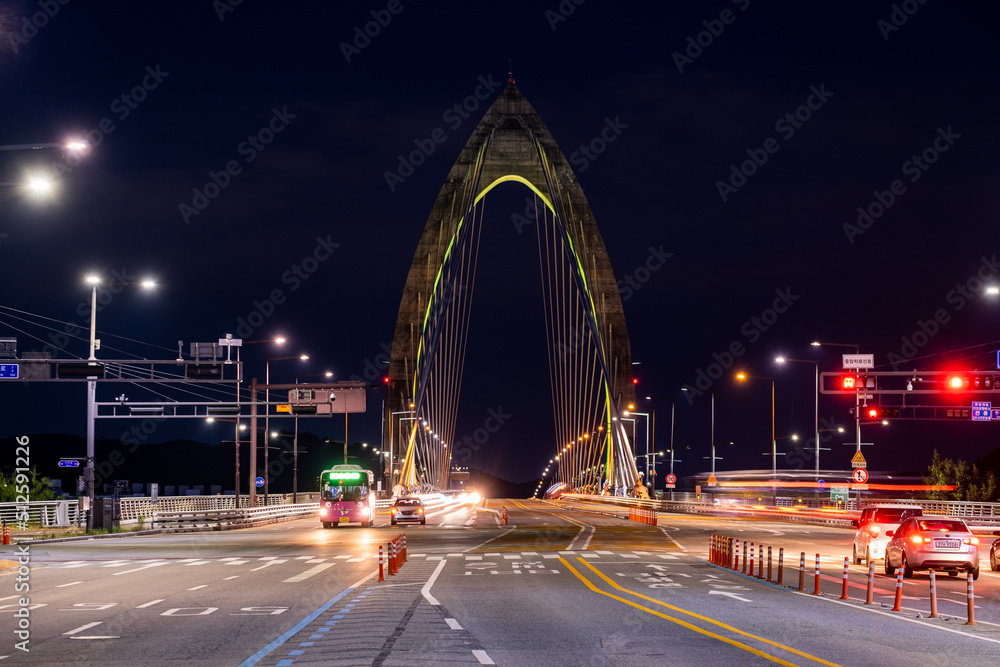 Scenic view of cars and light trails during sunset Scenic view of cars and light trails during sunset