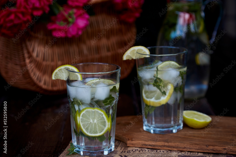 Homemade non-alcoholic mojito with lemon, lime and mint. Refreshing, diet, detox infused, natural summer cocktails. Healthy refreshing cocktails. Summertime drinks. Homemade non-alcoholic mojito with lemon, lime and mint. Refreshing, diet, detox infused, natural summer cocktails. Healthy refreshing cocktails. Summertime drinks.