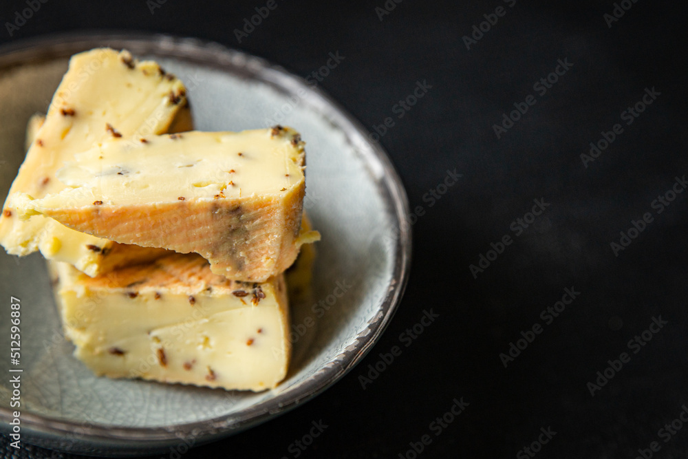 munster cheese cumin seeds fresh healthy meal food snack diet on the table copy space food background rustic top view