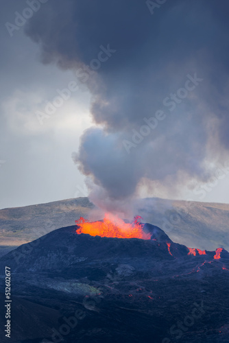 Lava explosion and smoke in the crater of the Fagradalsfjall volcano during the eruption in August 2021, Iceland