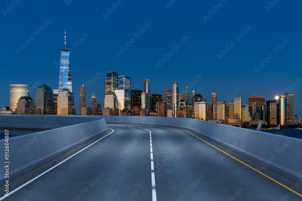 Obraz premium Empty urban asphalt road exterior with city buildings background. New modern highway concrete construction. Concept of way to success. Transportation logistic industry fast delivery. New York. USA.