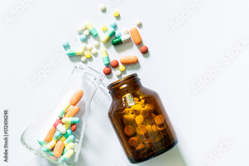 Medical: Pills and bottle, aerial view ,drug trials and pill bottles,science experiment flask
