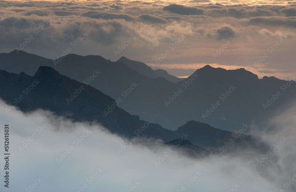 mountains over the clouds