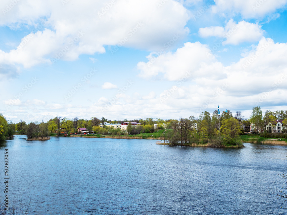 white clouds in blue sky over lake in Gatchina