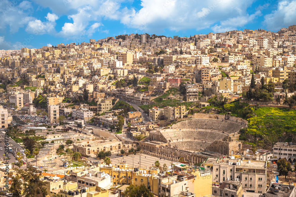 skyline of Amman, capital of Jordan, with roman theater