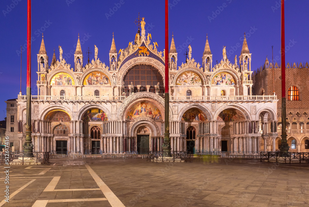 Venice. Facade of St. Mark's Cathedral in night illumination at dawn.