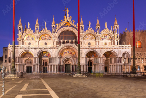Venice. Facade of St. Mark's Cathedral in night illumination at dawn.