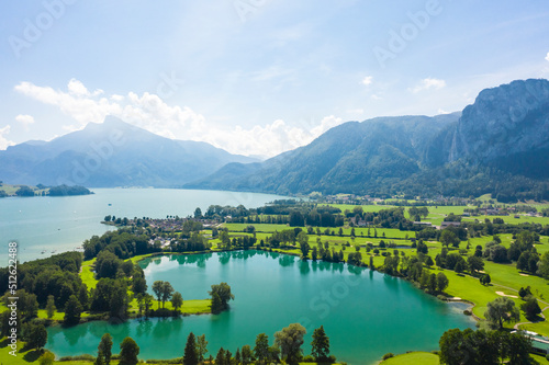 Aerial of Mondsee lake and golfing fields, Mondsee, Austria