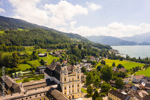 Aerial of Mondsee village with Basilika saint Michael on the lake, Mondsee, Upper Austria, Austria