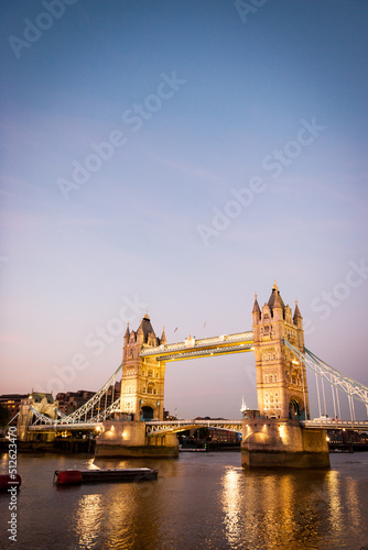Tower Bridge and the River Thames, London. A dusk view over the Thames with the iconic Tower Bridge landmark dominating the scene.