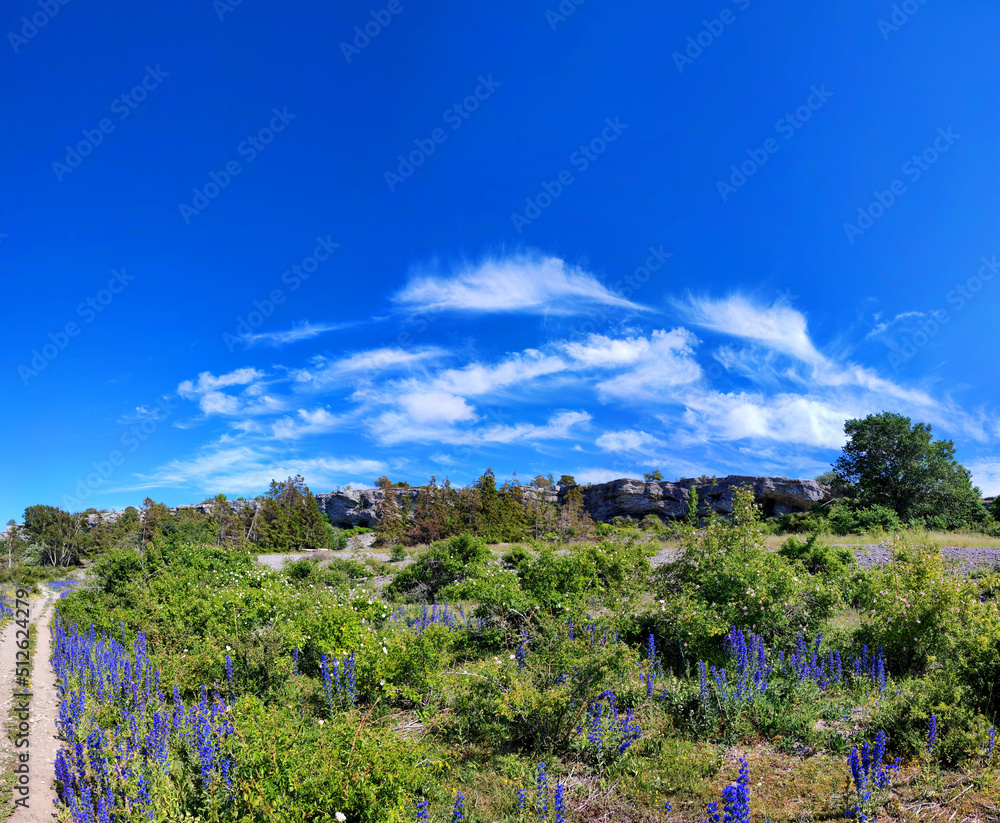 Clouds passing over rocky limestone landscape panorama