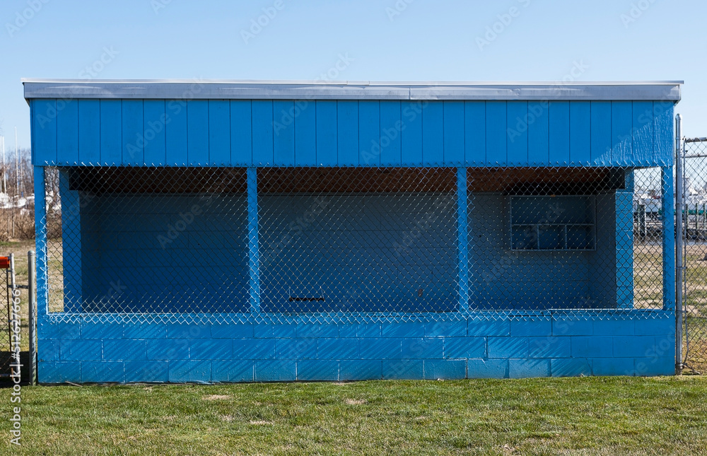 Fototapeta premium Rural community wooden baseball dugout. Simple sparse.