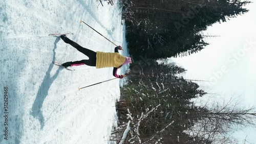 Young athlete goes skiing in slow motion