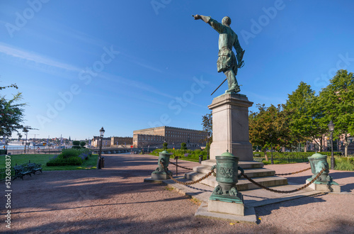 King Xll on a pedestal point east the royal castle at the bay Strömmen a summer day in Stockholm