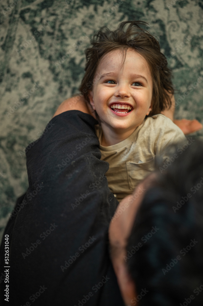 dad plays with his son, father spends time with his children, they have fun, fool around and run, the relationship between father and child. The concept of a happy family dad plays with his son, father spends time with his children, they have fun, fool around and run, the relationship between father and child. The concept of a happy family
