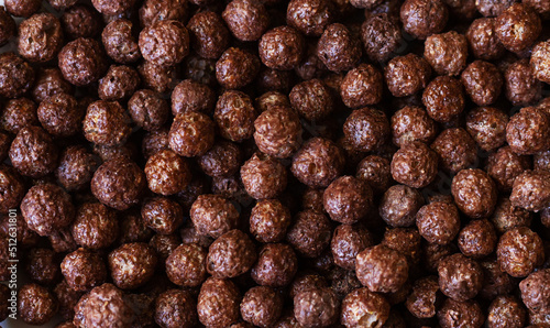 Cereal chocolate corn balls as breakfast background