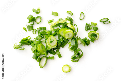 Chopped stems of green onion or chives isolated on white, top view.