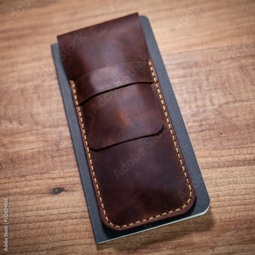Luxury wintage handmade brown leather pen case.