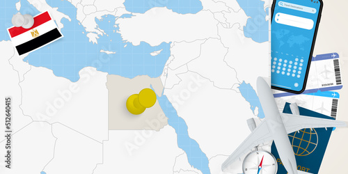 Travel to Egypt concept, map with pin on map of Egypt. Vacation preparation map, flag, passport and tickets.