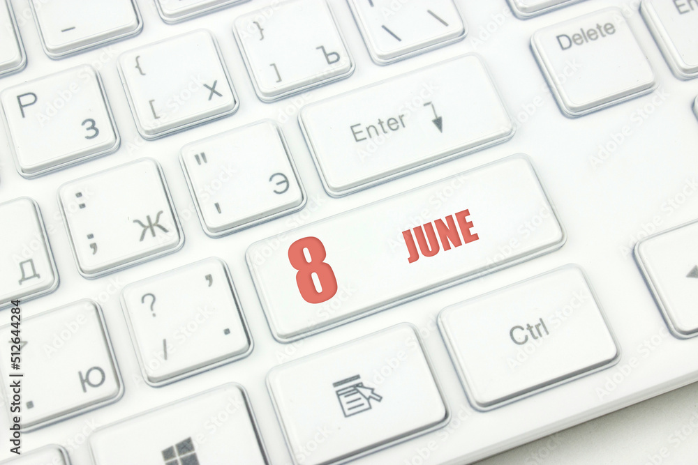 June 8th. Day 8 of month, Calendar date. Cropped view of Modern White Computer Keyboard with calendar date. Concept workspace, freelance, deadline. Summer month, day of the year concept. June 8th. Day 8 of month, Calendar date. Cropped view of Modern White Computer Keyboard with calendar date. Concept workspace, freelance, deadline. Summer month, day of the year concept.